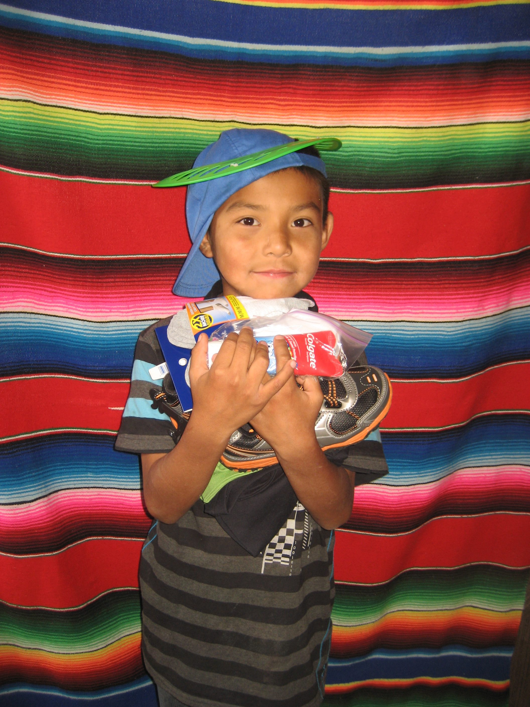 Child receiving Christmas gifts