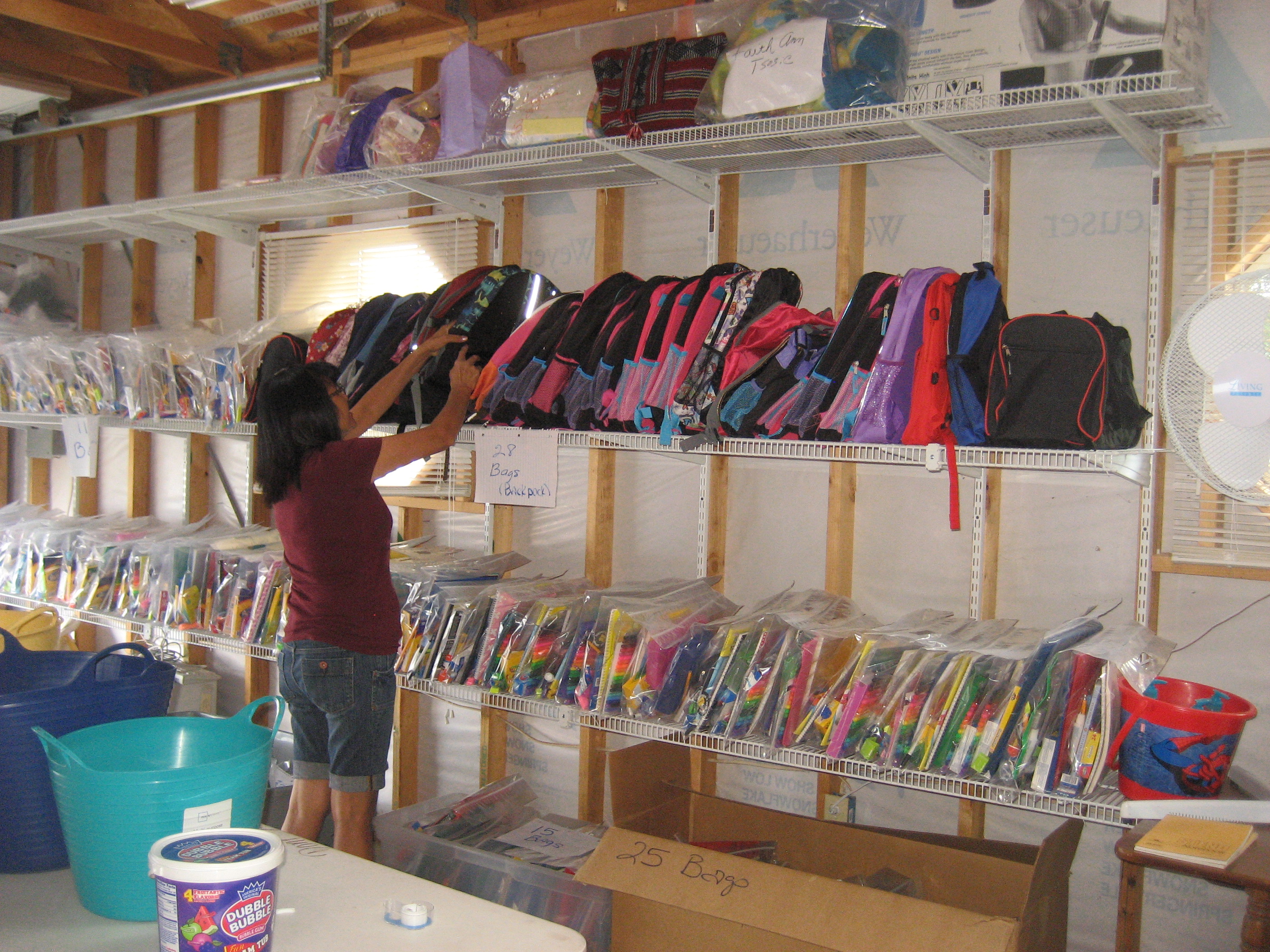 Backpacks and school supplies ready to be given