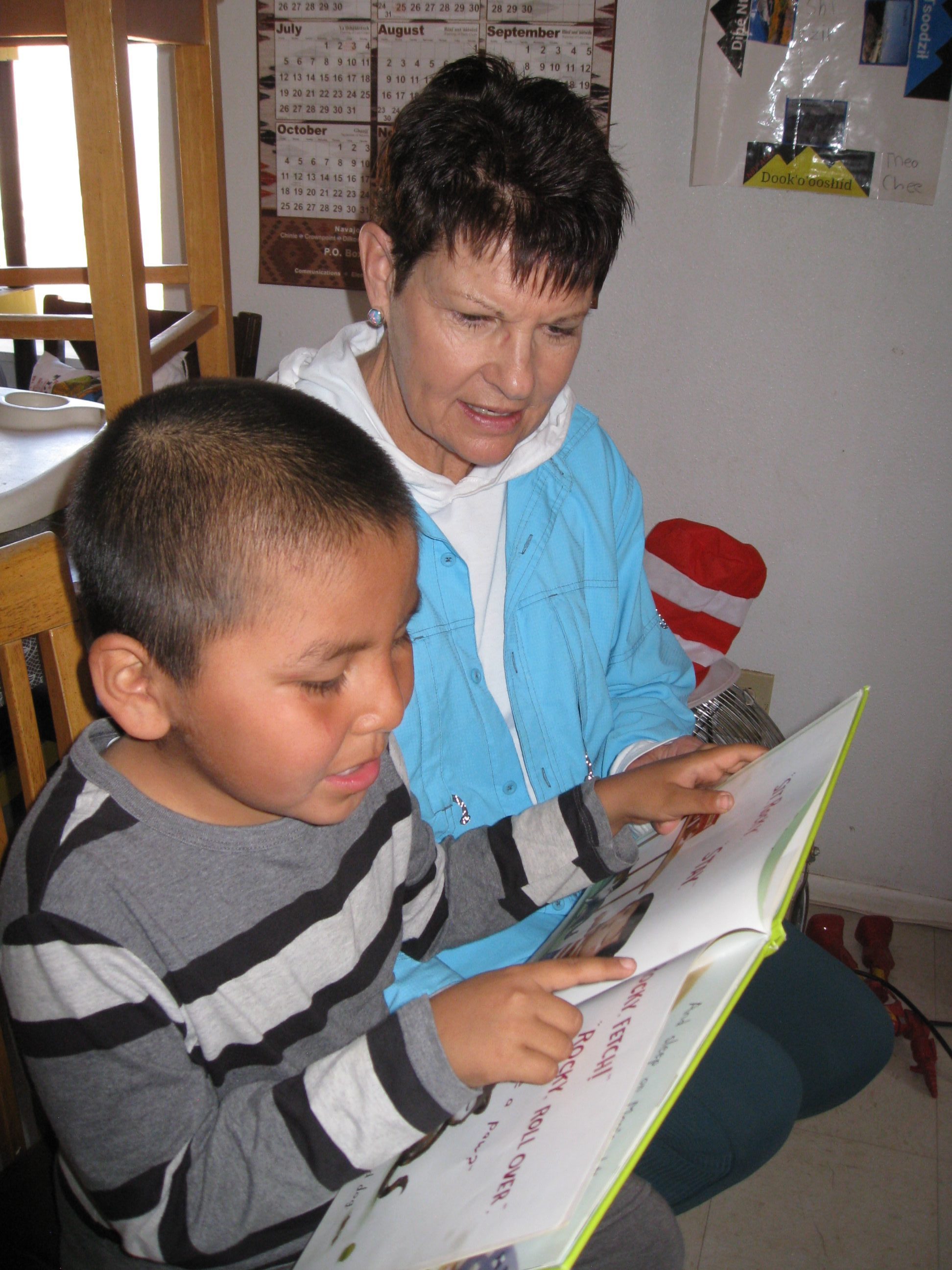 Sylvia reading with a child